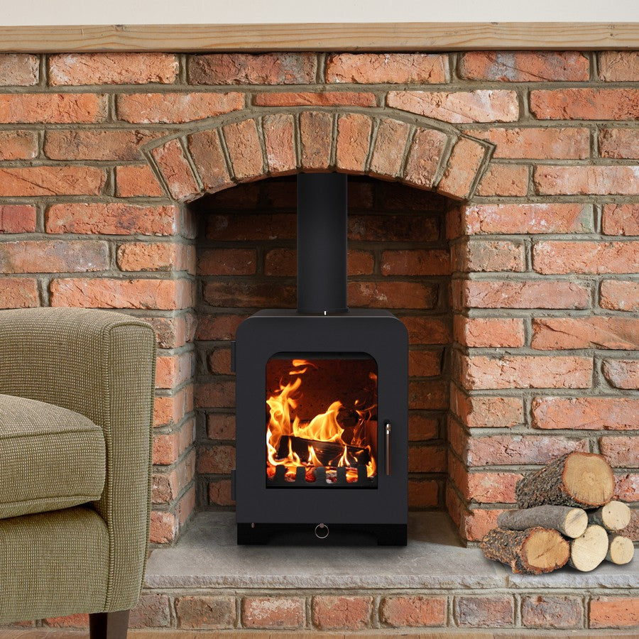 ST2 Woodburning Stove By Saltfire In Brick Surround